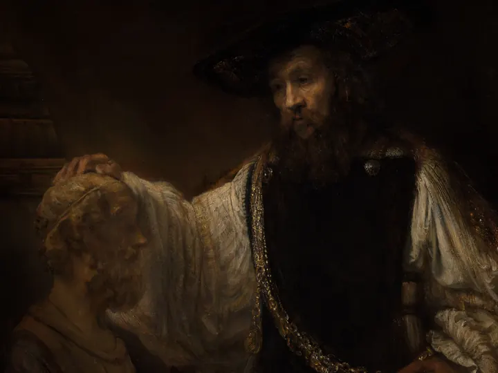 In deep shadow, an old bearded man in a broad black hat and a gold chain rests his hand on a pale marble bust.
