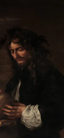 A long-haired man in a leafy wreath writes with a quill on a skull.