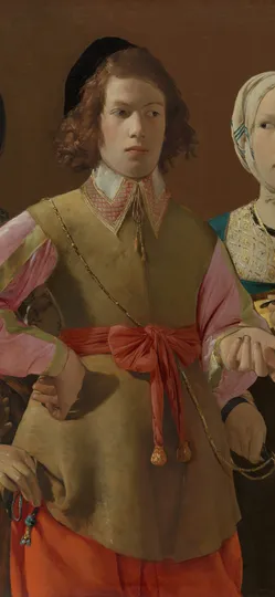 An old woman holds up a coin to a young man while three young women stand close around him.